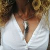 Light necklace in the shape of angel wings