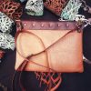 Brown shoulder bag, with abstract natural motifs - Image 4