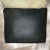 Red and black shoulder bag with organic texture flap - Image 8