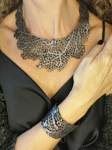 Platinum color necklace with sea coral texture design