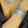 Platinum color leather bracelet with sea coral textured design
