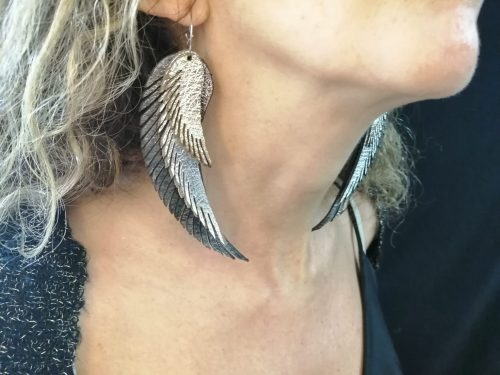 Light silver earrings in the shape of angel wings