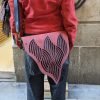 Red and black shoulder bag with organic texture flap - Image 2
